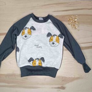 Jersey infantil de perritos que crece con los peques, hecho por la sombra del gato