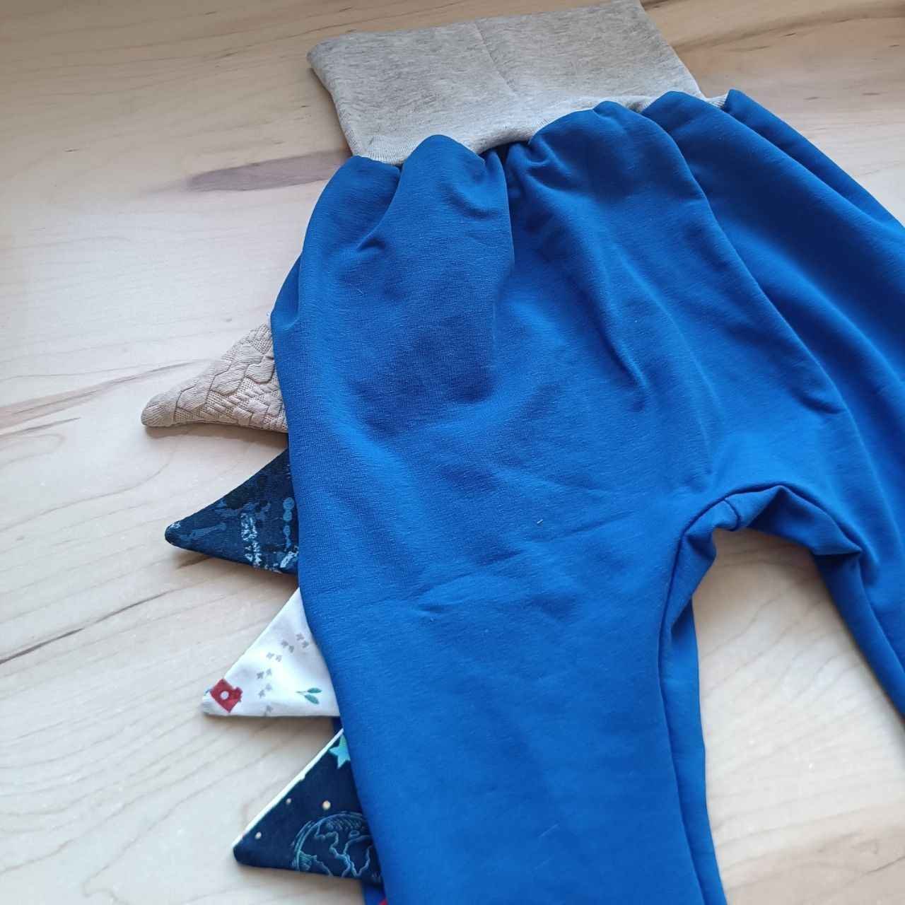Pantalones evolutivos personalizables con escamas de dragón de La sombra Del Gato